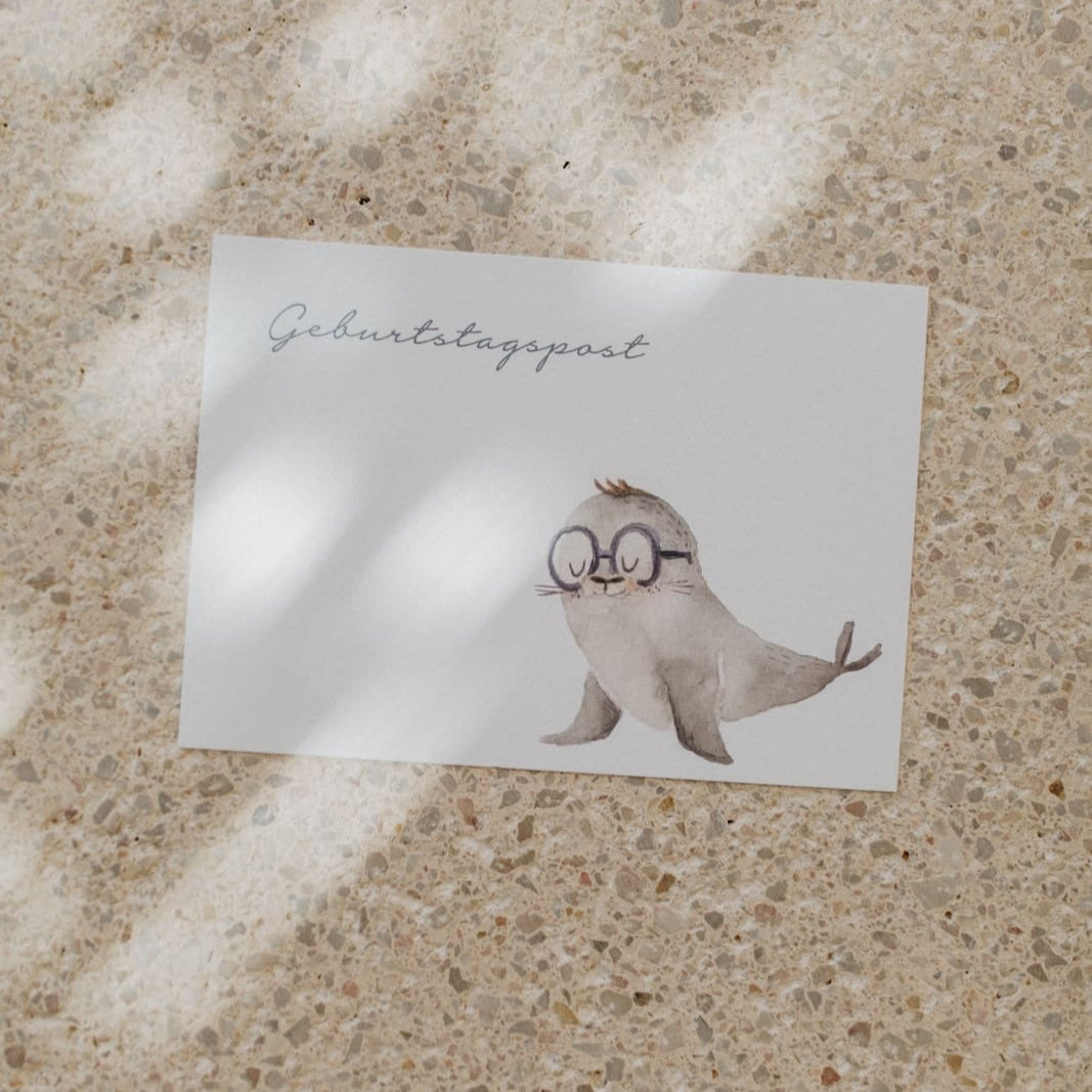 Postkarte Geburtstagspost – Süßer Gruß mit Robbe